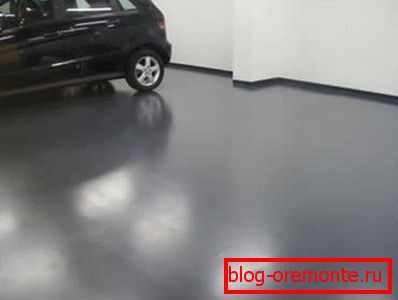 Vo foto - parkovisku, betónová podlaha, ktorá bola profesionálne pokrytá polymérmi Vo foto - parkovisku, betónová podlaha, ktorá bola profesionálne pokrytá polymérmi